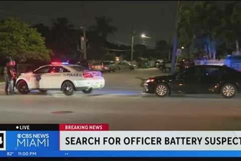 Police search for officer battery suspect